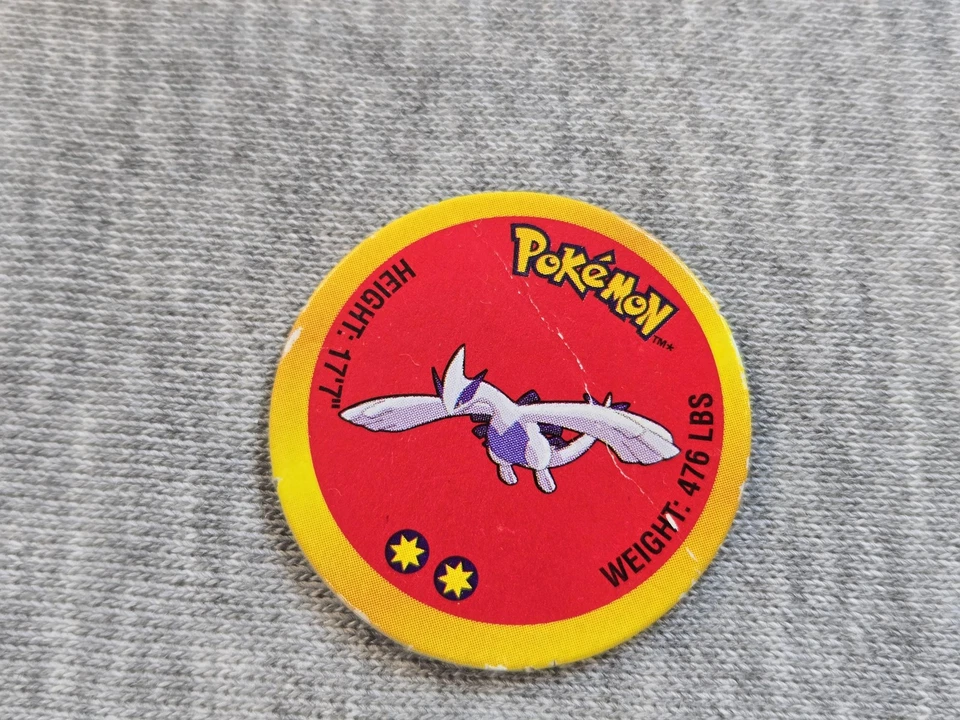 Figura de acción Pokemon Lugia 2000 vintage TOMY Nintendo juguete con moneda Pog coleccionar Foto 4 de 4