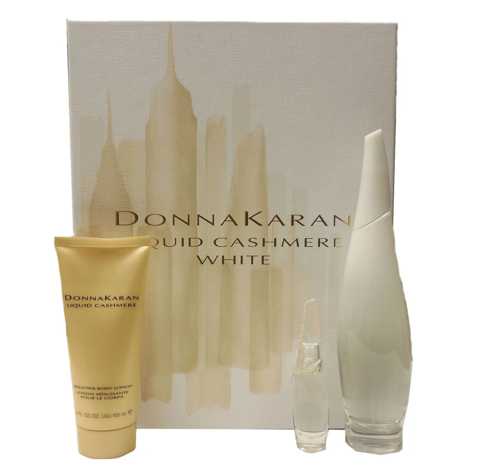 JUEGO DE REGALO DONNA KARAN CACHEMIR LÍQUIDO BLANCO CON EAU DE PARFUM SPRAY 100 ML NUEVO EN CAJA Foto 2 de 2