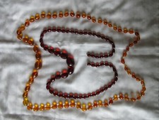 TWO ART DECO FACETED CHERRY AMBER BAKELITE & HONEY AMBER BAKELITE BEAD NECKLACES