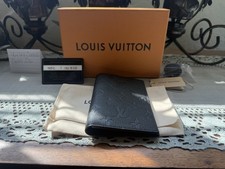 Louis Vuitton Black monogram empreinte leather passport cover