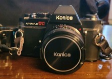 Konica Autoreflex TC Black 35mm SLR Film Camera w/ Lens ,Cap, and Strap .