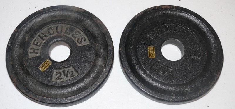 Set of 2 Vintage Hercules 2 1/2 pound 1 inch standard weight plates 5 lbs total