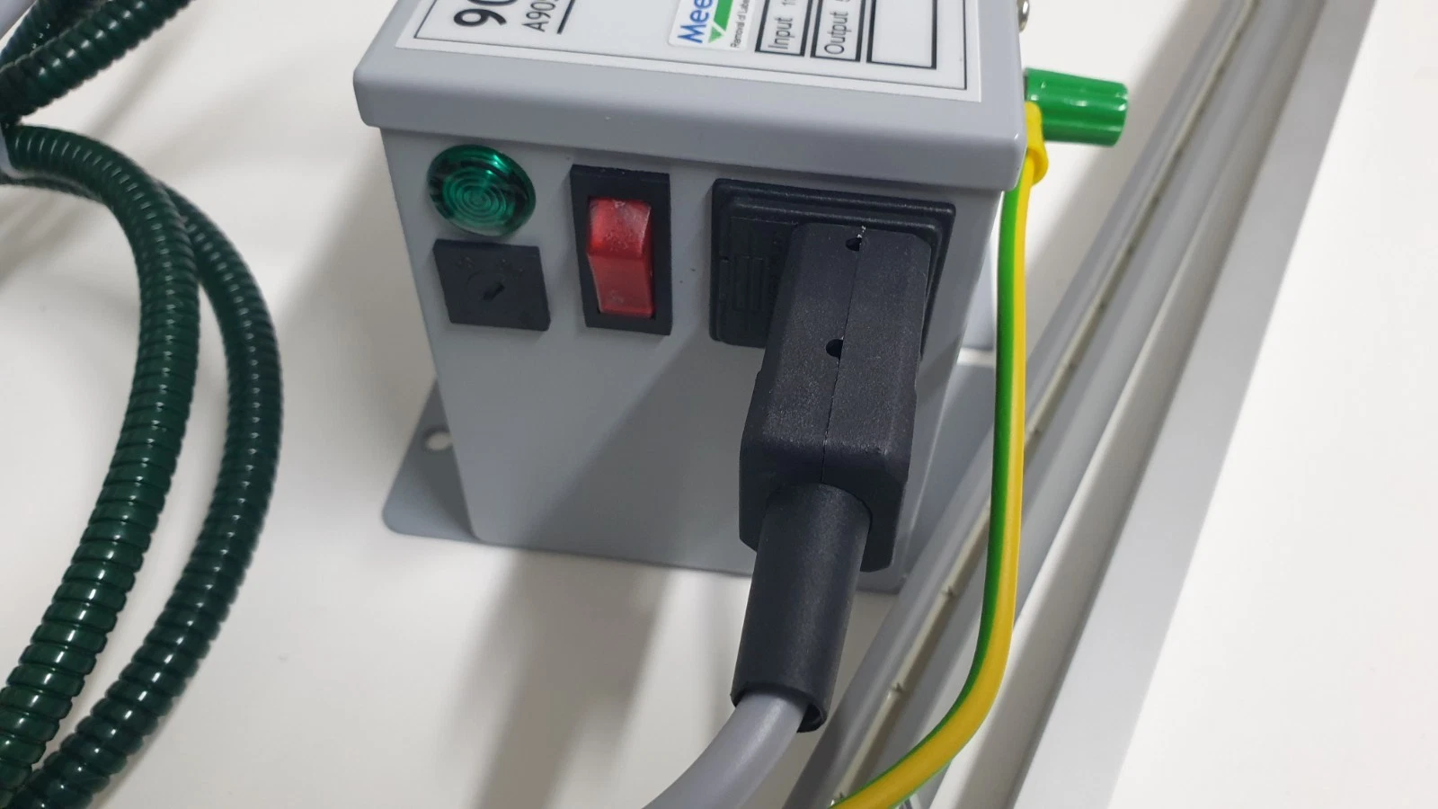 End of the Meech 905 unit: green lamp, red switch and mains inlet with plug