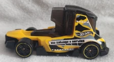 Hot Wheels Black and Yellow Haul-O-Gram Salvage Service Vehicle