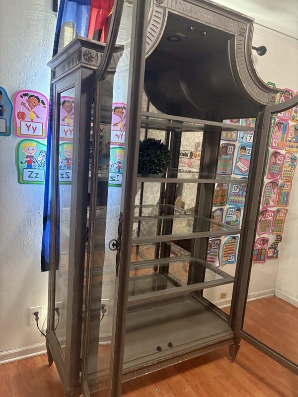solid wood cabinet with thick glass shelves