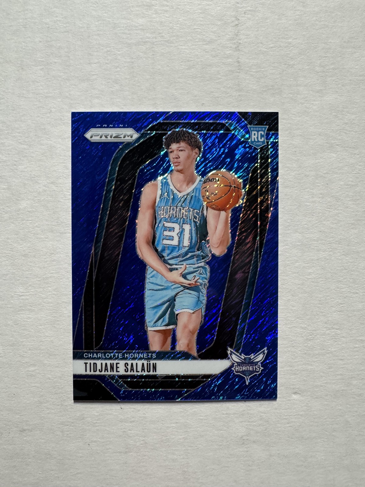 2024-25 Panini Prizm #262 Tidjane Salaun Blue Shimmer FOTL Rookie Card RC #/35