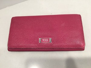 tumi clutch wallet