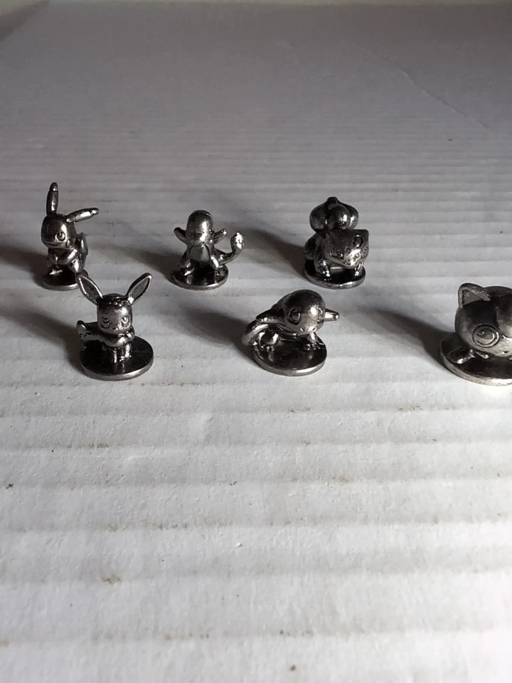 Juego de 6 fichas de metal Pokemon Monopoly Kanto Edition 2014 Pikachu Bulbasaur  Foto 3 de 4