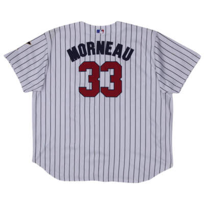 Minnesota Twins first baseman Justin Morneau #33 makes a base hit in