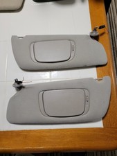 1999-2004 Jeep Grand Cherokee Lighted Sun Visor Pair Gray Mirrors Oem 1999-2004 Jeep Grand Cherokee Lighted Sun Visor Pair Gray Mirrors Oem