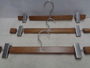 CK Calvin Klein Jeans 4 nice wooden hangers from NYC show room ? Fancy ornate