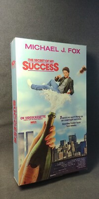 Large 1987 VHS Movie Store Display The Secret of My Success Michael J Fox 7''x13''