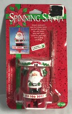 VINTAGE SPINNING SANTA SANTA SPINS INTO THE HOLIDAY SPIRIT NEW IN PACKAGE