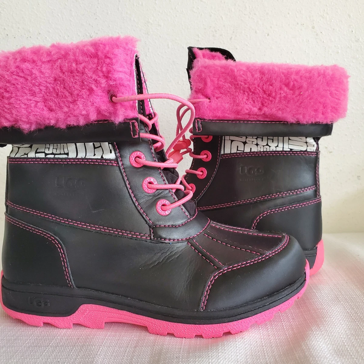 Black and pink ugg boots hot sale