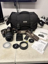 Cámara digital Nikon D5200 SLR 24,1 MP marrón 18-55 mm VR kit de lente bolsa cargador