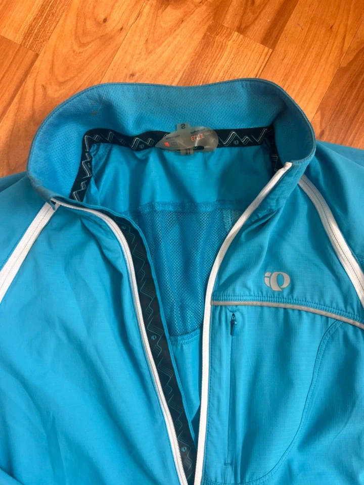 Chaqueta cortavientos PEARL IZUMI Elite Barrier empaquetable con caparazón de lluvia para mujer S azul Foto 2 de 4