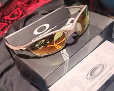 Oakley Juliet X-Metal Sunglasses with Plasma frames and Fire lenses.