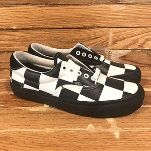 black and orange checkered vans