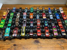 HOT WHEELS/SPIN MASTER MONSTER TRUCKS 1:64 SCALE LOT OF 40, LOOSE, USED