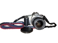 Canon Rebel EOS 35mm Film Camera with Lens, Hood, Lens Cover  2 Rolls of Film