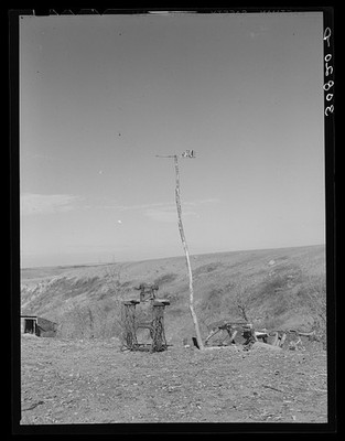 Photo:Sewing machine and makeshift weathervane near Williston North Dakota