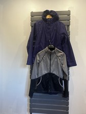 The North face waterproof coat with retractable Top Inside. Ladies Size UK Small