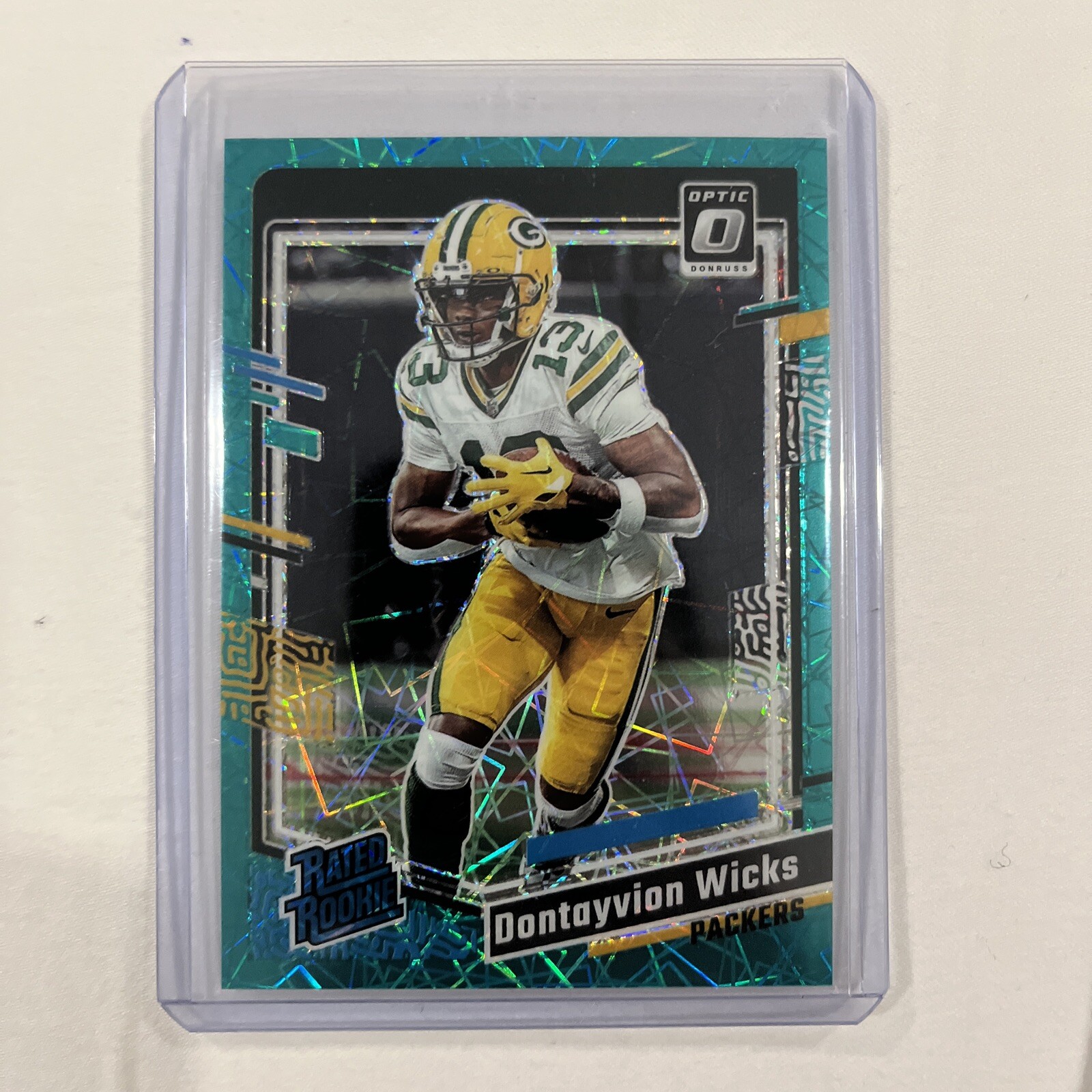 2023 Donruss Optic Dontayvion Wicks Teal Velocity Prizm Rated Rookie #249