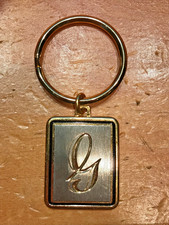 GOLD  SILVER TONE WITH LETTER INITIAL " G" KEY CHAIN