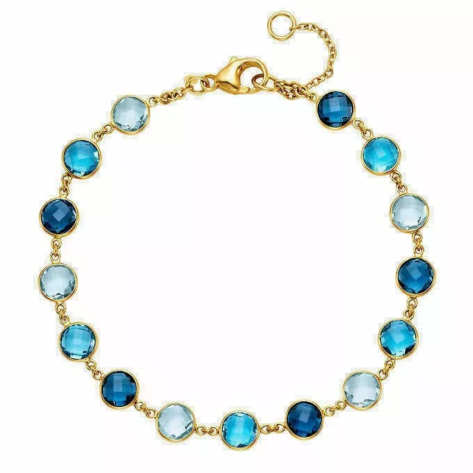 Blue topaz bracelet deals yellow gold