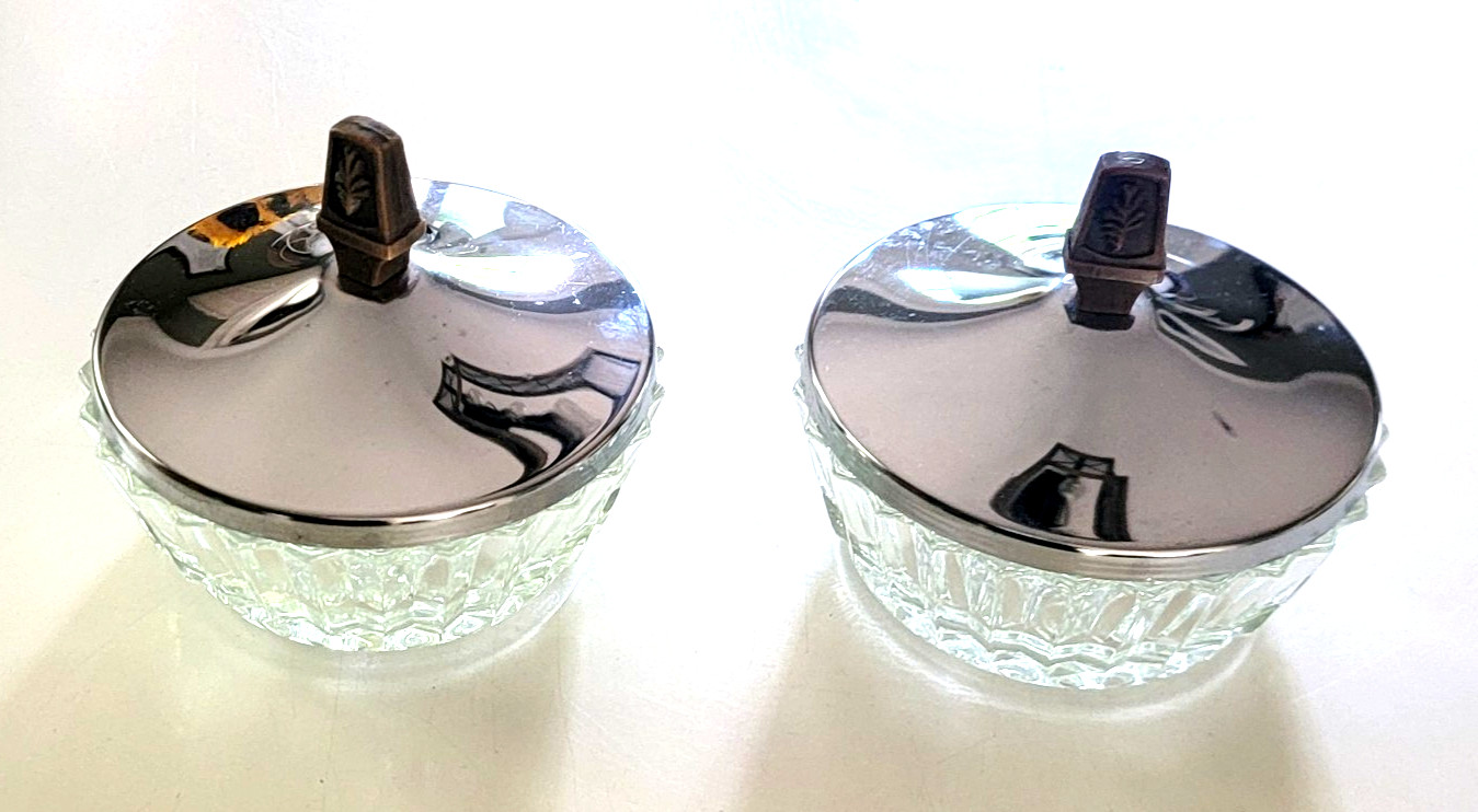 Pair of clear crystal candy dishes with chrome lids, mid-century modern