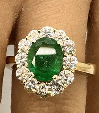 Emerald And Brilliant Cut Diamond In 18 Carat White And Yellow Gold 