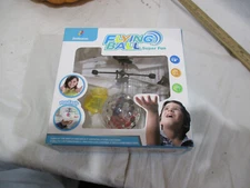 Flynova Pro Flying Toys Boomerang Ball Spinner Tricks Hand Operated drone RED