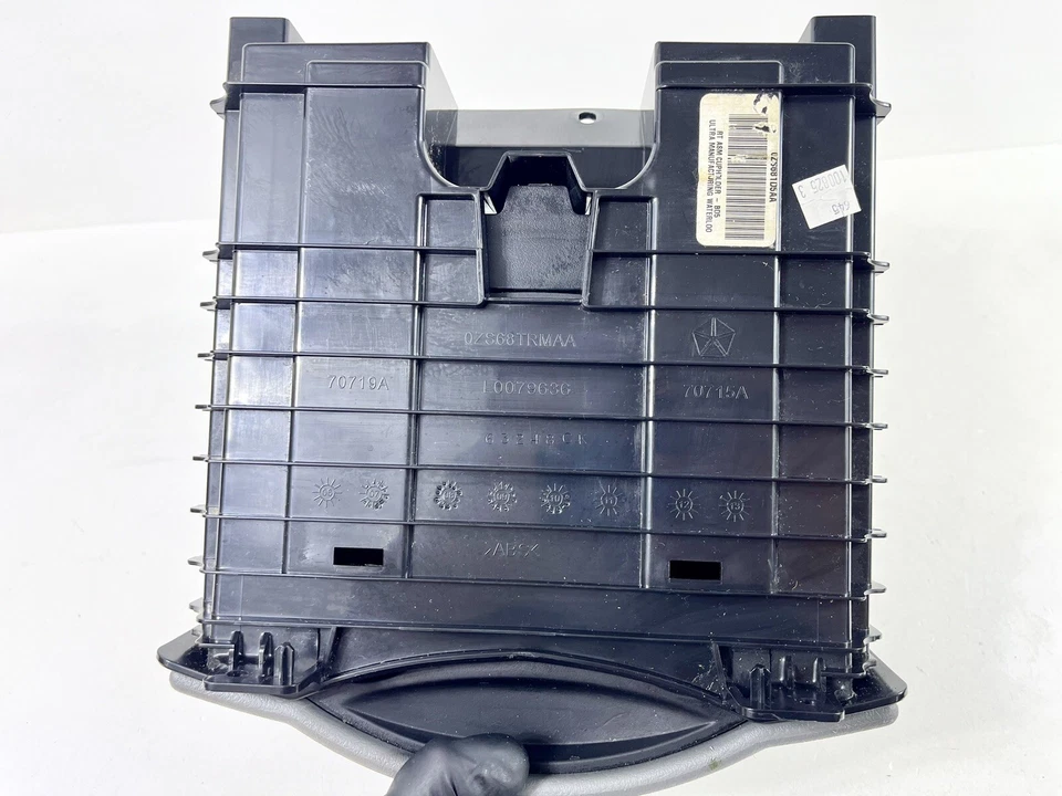 Dodge Caravan Town & Country 2008-2010 consola portavasos deslizante central delantera Foto 4 de 4