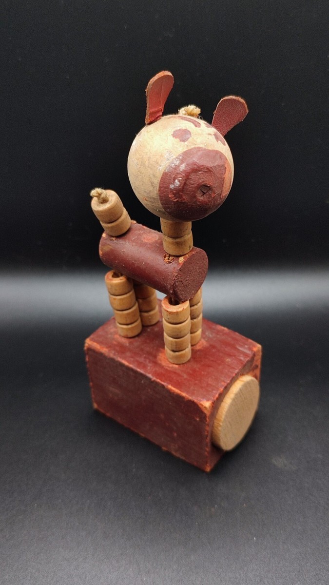 Ancien jouet articulé Wakouwa Francelette vache/taureau marron
