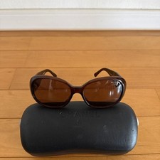 Occhiali da sole donna CHANEL montatura marrone camelia