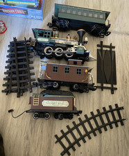 Greatland Express train cars and 5 pieces of track