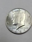 1987 D Kennedy Half Dollar  FLASHY UNCIRCULATED !  Pretty COLOR !!
