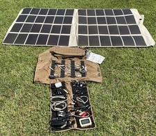 Portable solar power management roll kit with 2 foldable Powerfilm 60 W panels