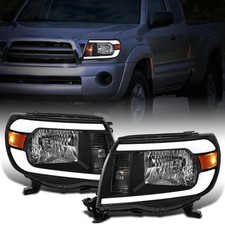 - Fits 2005-2011 Toyota Tacoma Halogen Headlights Pair Black