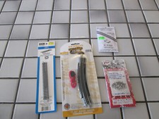 lot of misc. N SCALE track,uncoupler, ect. ////