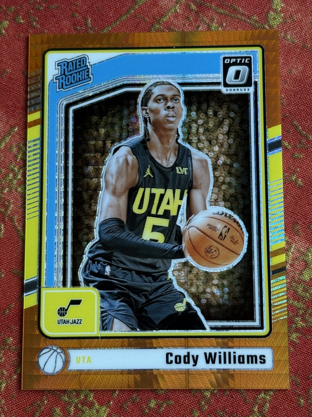 2024-25 Panini Donruss Optic Cody Williams Rookie Hyper Orange /299 #298 RC Jazz