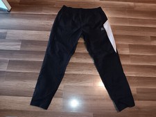 Reebok Womens Size large Black color windbreaker jogger pants