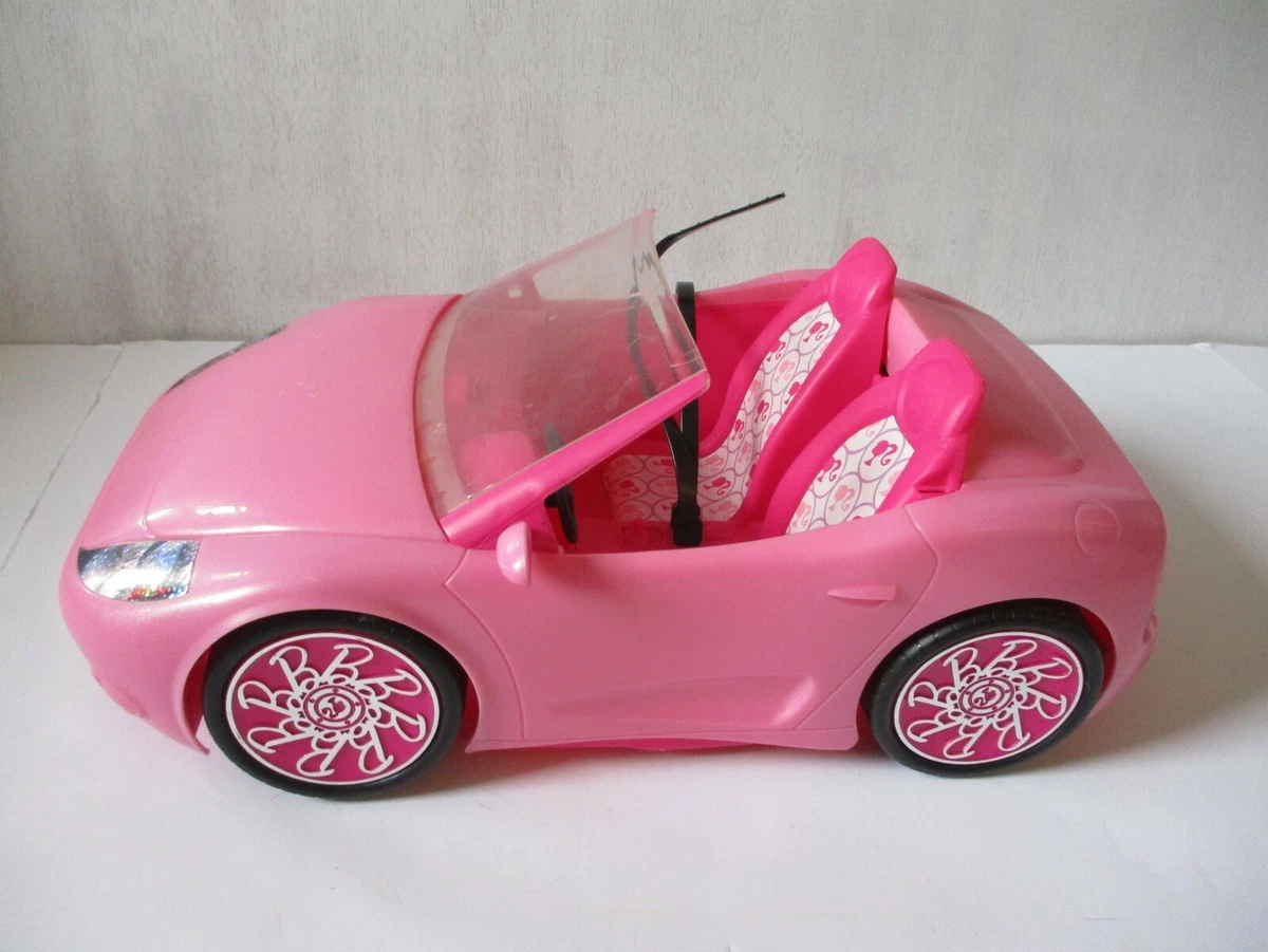 Barbie in top pink car