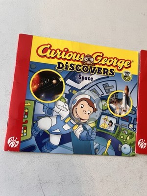 Curious George Discovers Space (science storybook) - Paperback Book - GOOD