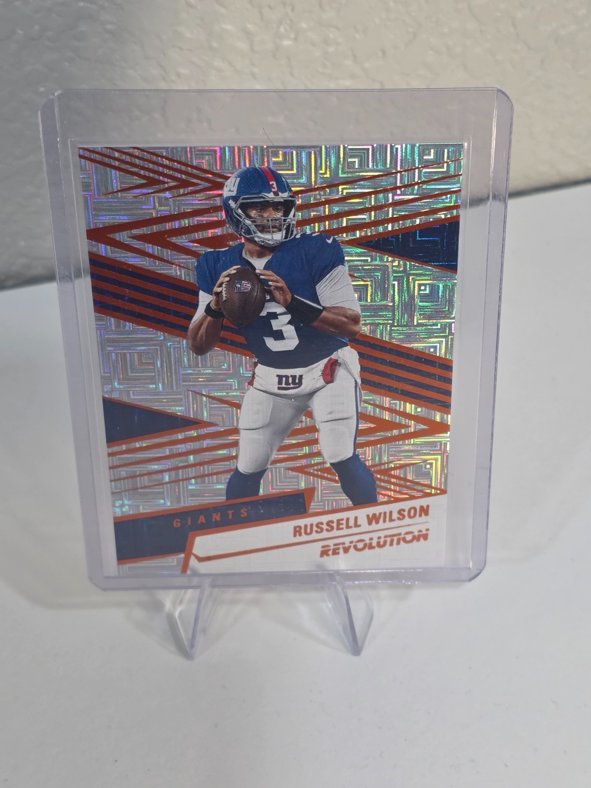 2025 Revolution Russel Wilson #114 Orange Levels 56/299 New York Giants