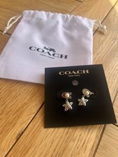 Coach earrings - sterling silver completely unworn never used. 
