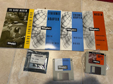 Megahertz PC card modem, installation guide, cable, & other lot, by US Robotics