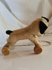Ancien jouet chien à roulettes années 1930