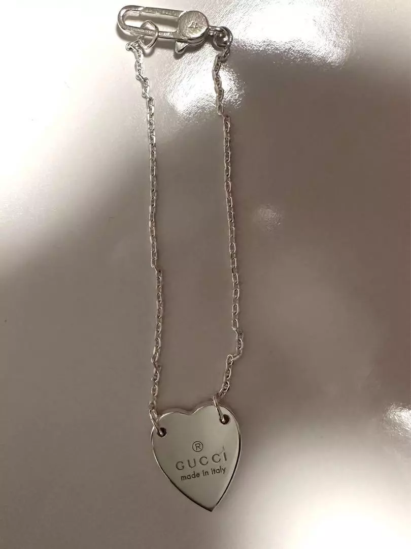 Bracelet pendentif coeur GUCCI argent bijou design marque authentique luxe