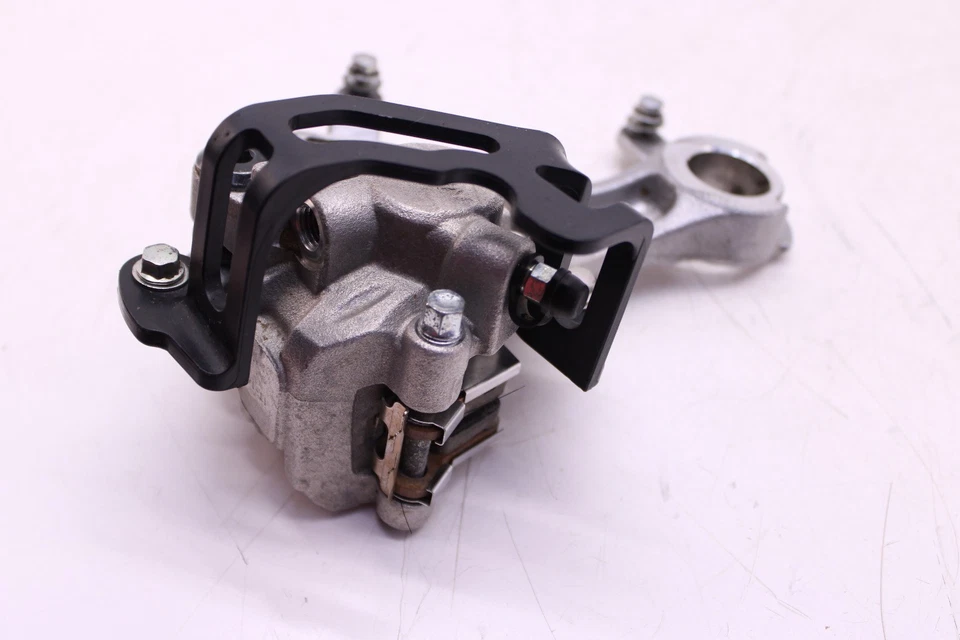 22-24 SUZUKI RMZ450 OEM CONJUNTO PINZA FRENO TRASERO. Foto 4 de 4